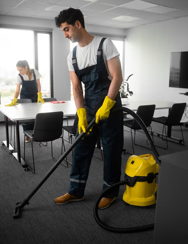Productive North team member cleaning an office desk