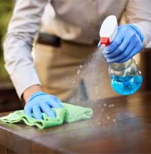 Close-up of disinfecting spray during a cleaning service
